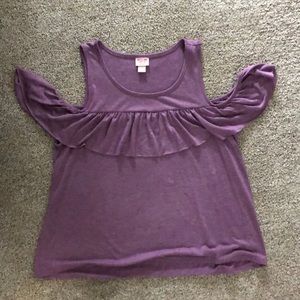 tank top with off the shoulder cuffs.